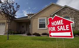 Home For Sale sign in front of an El Paso, TX residence.